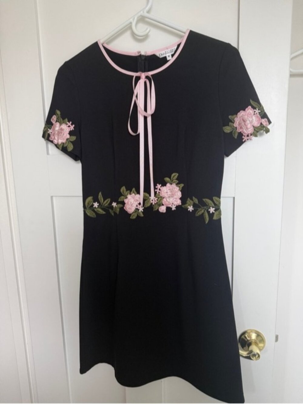 Black Mini Dress with Pink Floral Embroidery and Tie Neck